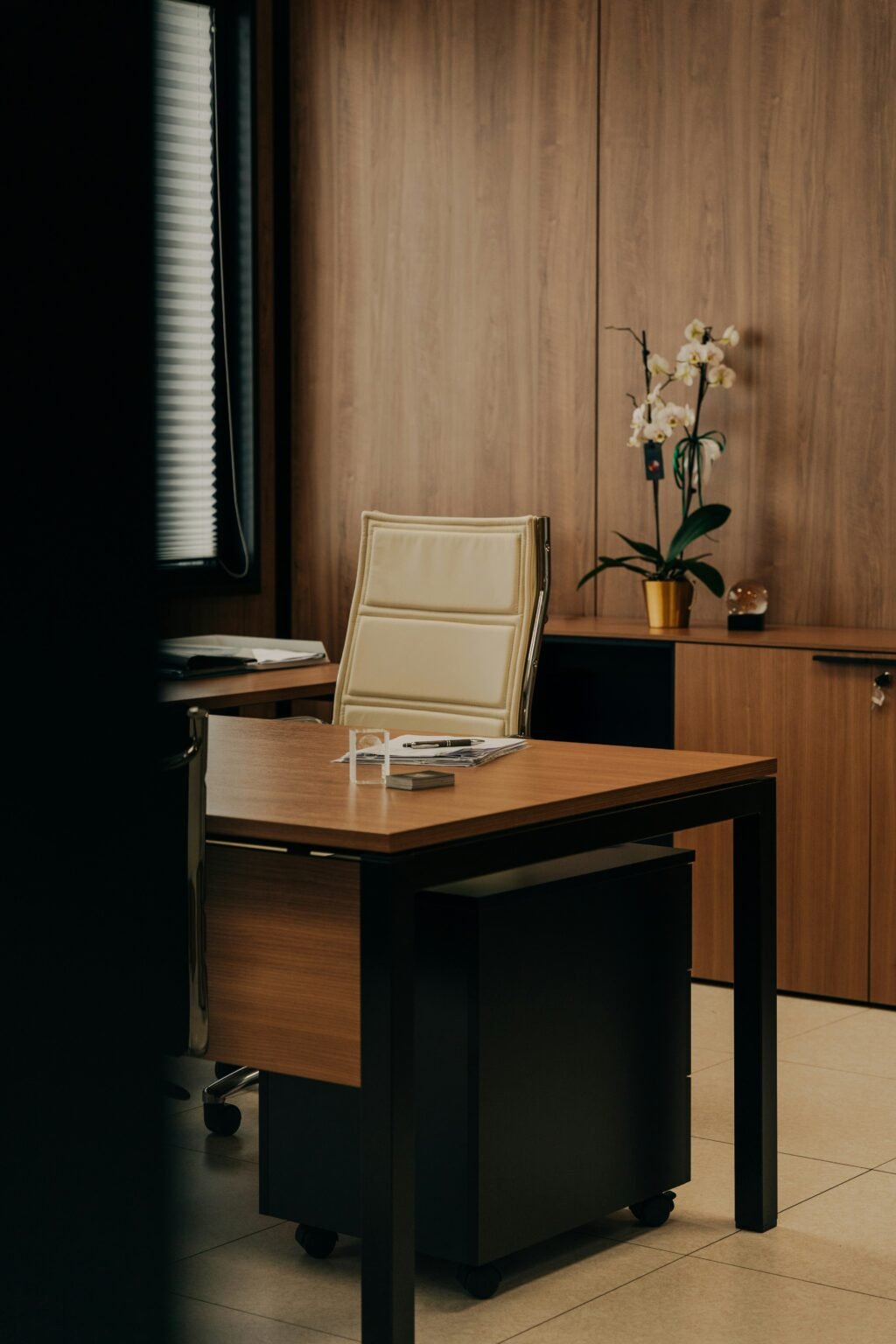 Private office space with a desk and chair.