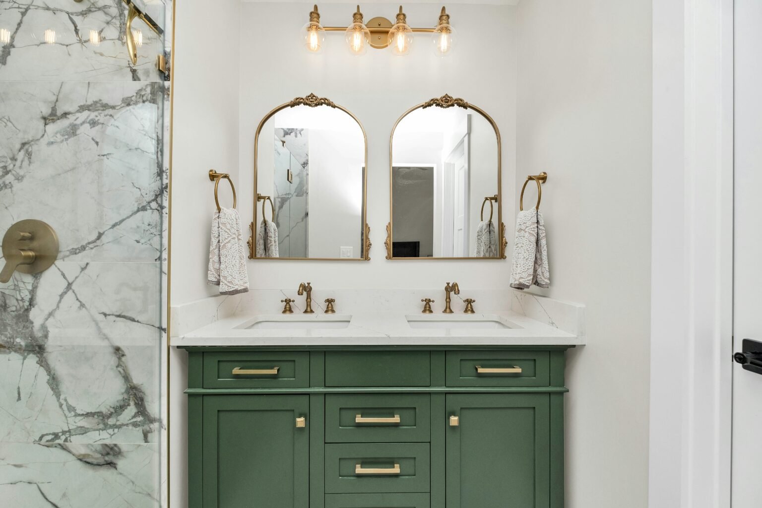 Bathroom double vanity with green cabinets